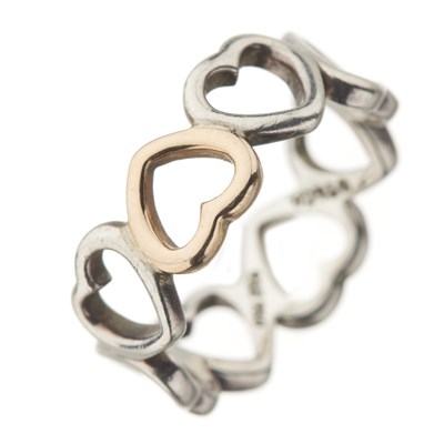 Lot 41 - Tiffany & Co., a silver and 18ct gold Open Loving Heart band ring