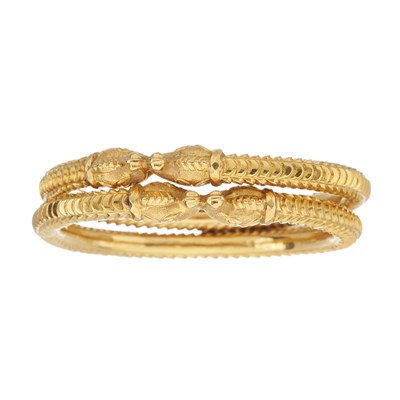 Lot 54 - Two 18ct gold zoomorphic dog bangles