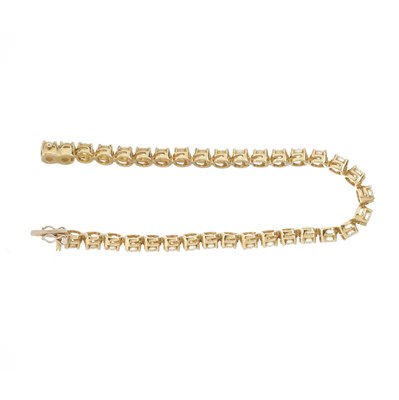 Lot 46 - An 18ct gold diamond line bracelet