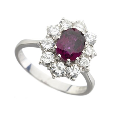 Lot 50 - An 18ct gold ruby and diamond cluster ring