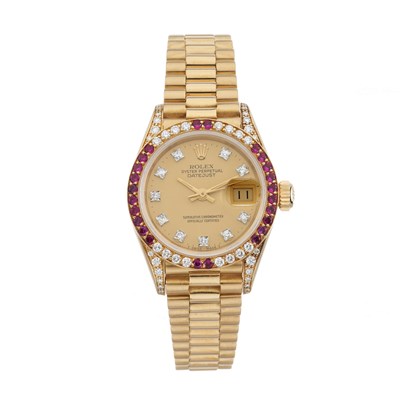 Lot 249 - Rolex, an 18ct gold factory set diamond and ruby Oyster Perpetual Datejust 26 bracelet watch