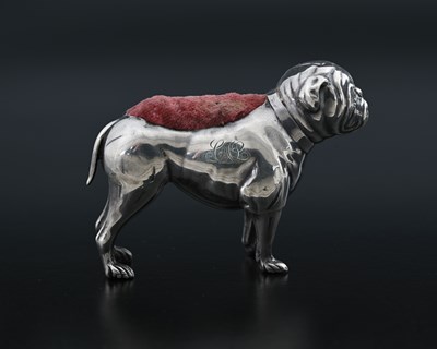 Lot 54 - An Edwardian novelty silver pin cushion,...