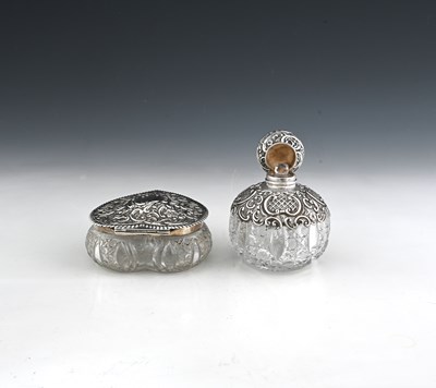 Lot 155 - A Victorian silver-mounted cut glass scent...