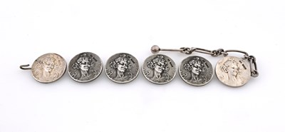 Lot 285 - A set of six Art Nouveau silver buttons, each...
