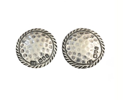 Lot 102 - A pair of Arts and Crafts silver buttons,...