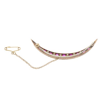 Lot 23 - A late Victorian ruby and diamond crescent brooch