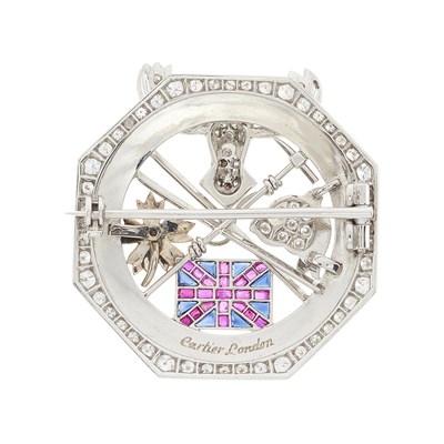 Lot 115 - Cartier, a platinum diamond, ruby, sapphire and enamel Canadian Ski Club brooch