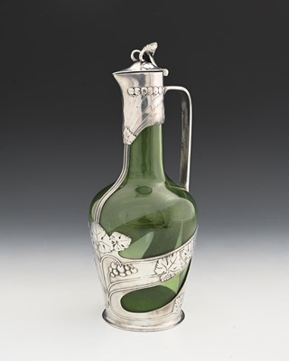 Lot 145 - Orivit, a Jugendstil pewter mounted green...