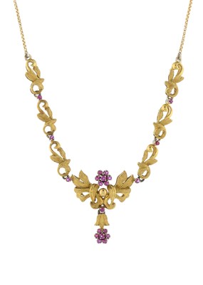 Lot 102 - Cropp & Farr, an 18ct gold ruby floral necklace