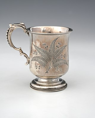 Lot 428 - A Victorian silver mug, the exterior decorated...