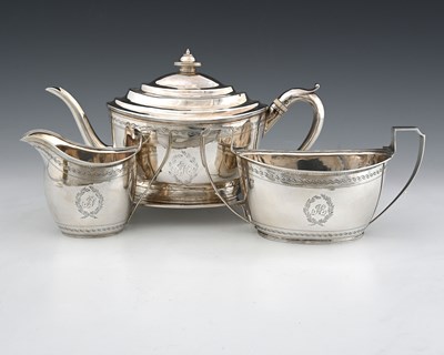 Lot 343 - A George III silver matched four-piece tea set,...