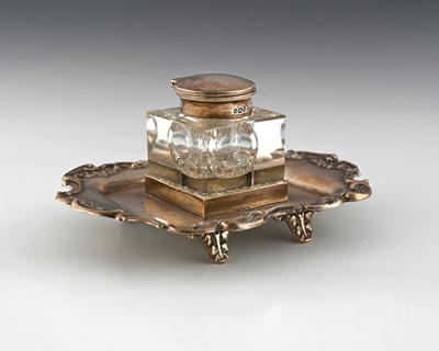 Lot 215 - A George V silver inkstand, the base of shaped...