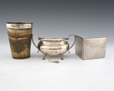 Lot 305 - A George V silver sugar bowl, atop four pad...