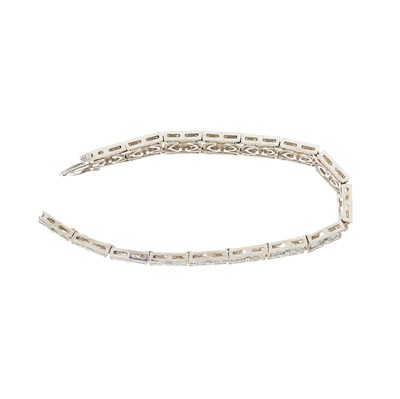 Lot 58 - A 14ct gold diamond geometric bracelet