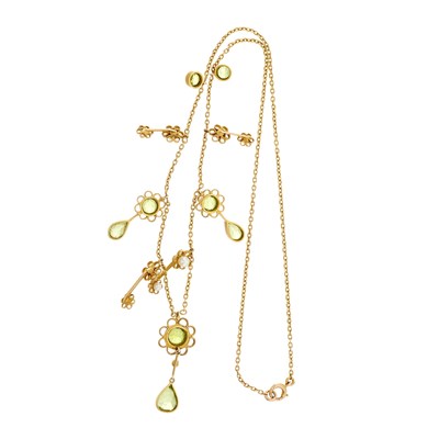 Lot 3 - An Edwardian 15ct gold peridot and seed pearl floral fringe necklace