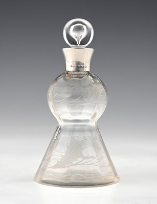 Lot 176 - A George V silver-mounted novelty glass scent...