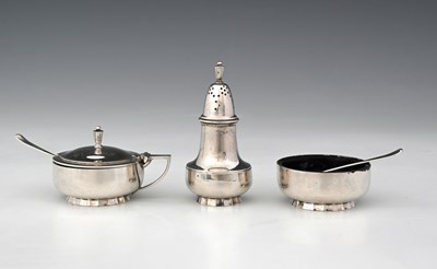 Lot 294 - An Elizabeth II silver three-piece condiment...