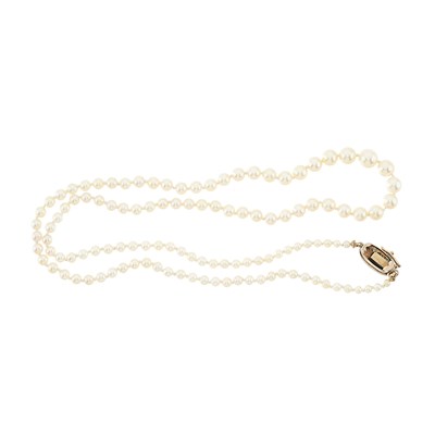 Lot 18 - An early 20th century pearl single-strand necklace, with gold diamond clasp