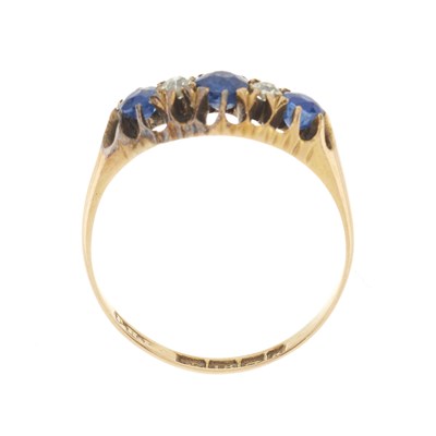 Lot 17 - An Edwardian 18ct gold sapphire and diamond five-stone ring