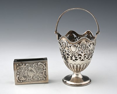 Lot 402 - An Edwardian silver swing-handle pedestal...