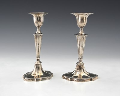 Lot 391 - A pair of late Victorian silver candlesticks,...