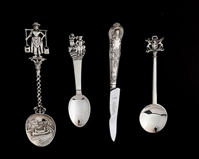 Lot 122 - A Dutch silver spoon, the embossed bowl...