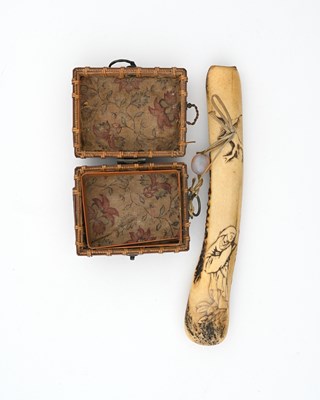 Lot 37 - A Japanese carved antler and bamboo sagemono...