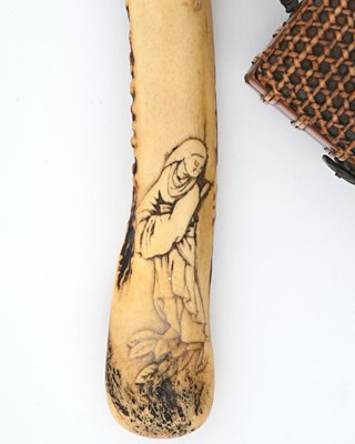 Lot 37 - A Japanese carved antler and bamboo sagemono...