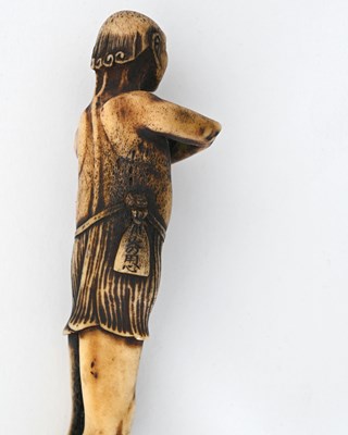Lot 36 - A Japanese carved antler kiseruzutsu (pipe...