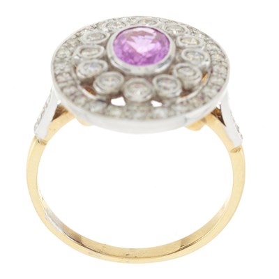 Lot 75 - An 18ct gold pink sapphire and diamond cluster ring