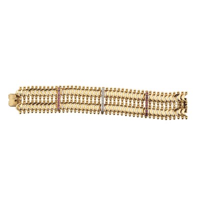 Lot 85 - An 18ct gold ruby and diamond articulated bracelet