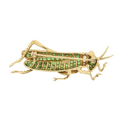 Lot 104 - Eli Frei, an 18ct gold green garnet, diamond and ruby grasshopper brooch