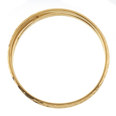 Lot 78 - Three high carat gold bangle bracelets