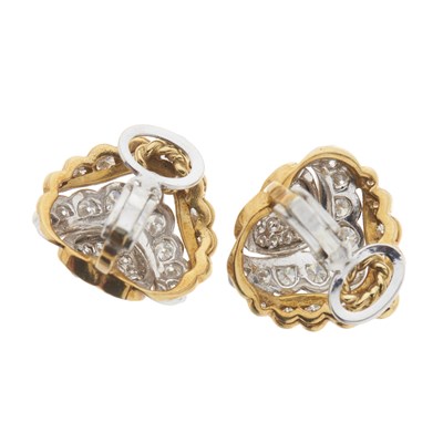 Lot 117 - A pair of 18ct bi-colour gold diamond heart-shape clip earrings