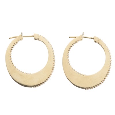 Lot 69 - A pair of gold diamond hoop earrings
