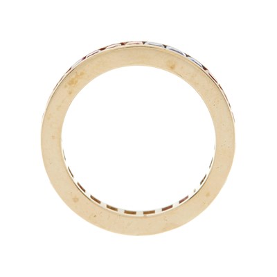 Lot 48 - A 14ct gold vari-hue sapphire full eternity ring