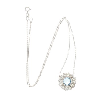 Lot 73 - An aquamarine and diamond cluster pendant, with chain
