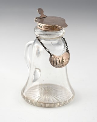 Lot 314 - A George V silver mounted glass whisky noggin,...