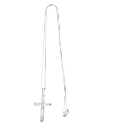 Lot 49 - An 18ct gold brilliant-cut diamond cross...