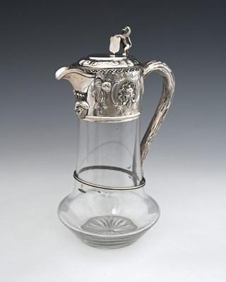 Lot 136 - A Victorian silver-mounted claret jug, the...