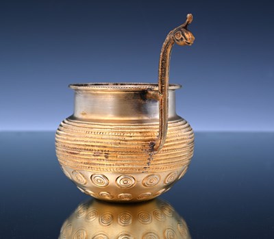 Lot 1 - A twentieth-century gilt metal revival of a...