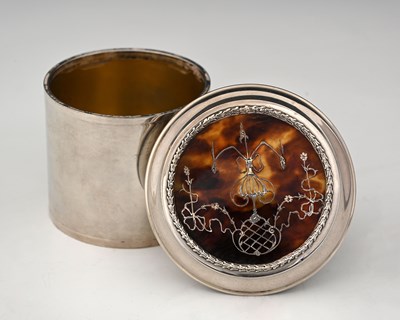 Lot 432 - An Edwardian silver jar and cover, with gilt...