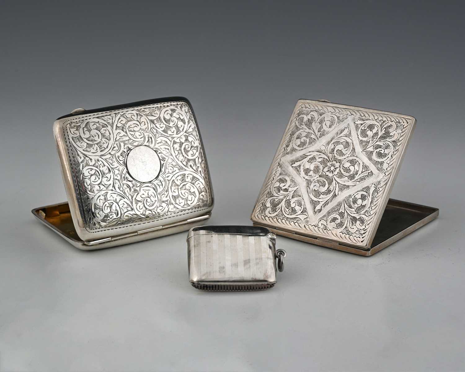 Lot 35 - A George VI silver cigarette case, of rounded...