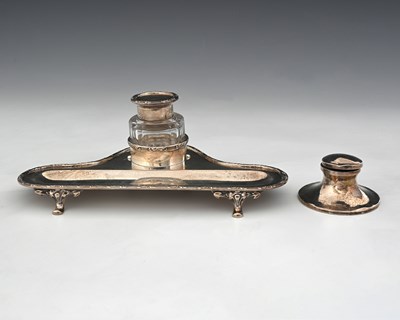 Lot 244 - An Edwardian silver inkstand, with a single...