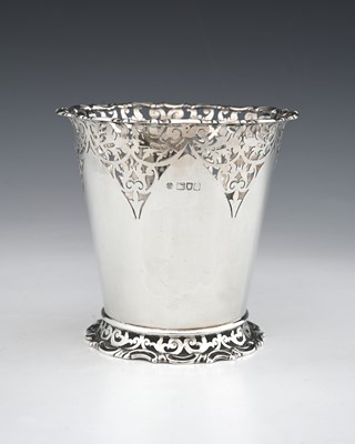 Lot 108 - A George V silver vase or bottle holder, of...