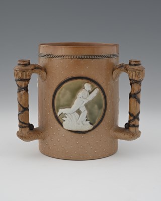 Lot 589 - A Doulton Lambeth stoneware cricket tyg, 1882,...