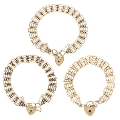 Lot 173 - Three 9ct gold gate bracelets, each with padlock clasp