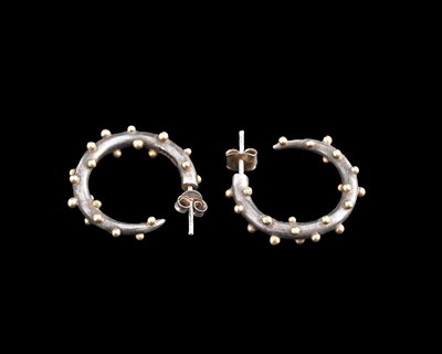 Lot 62 - Mark Nuell, a pair of silver and gold earrings