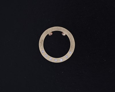 Lot 14 - An 18ct gold diamond band ring