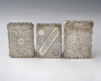 Lot 301 - Three English hallmarked silver card cases, to...
